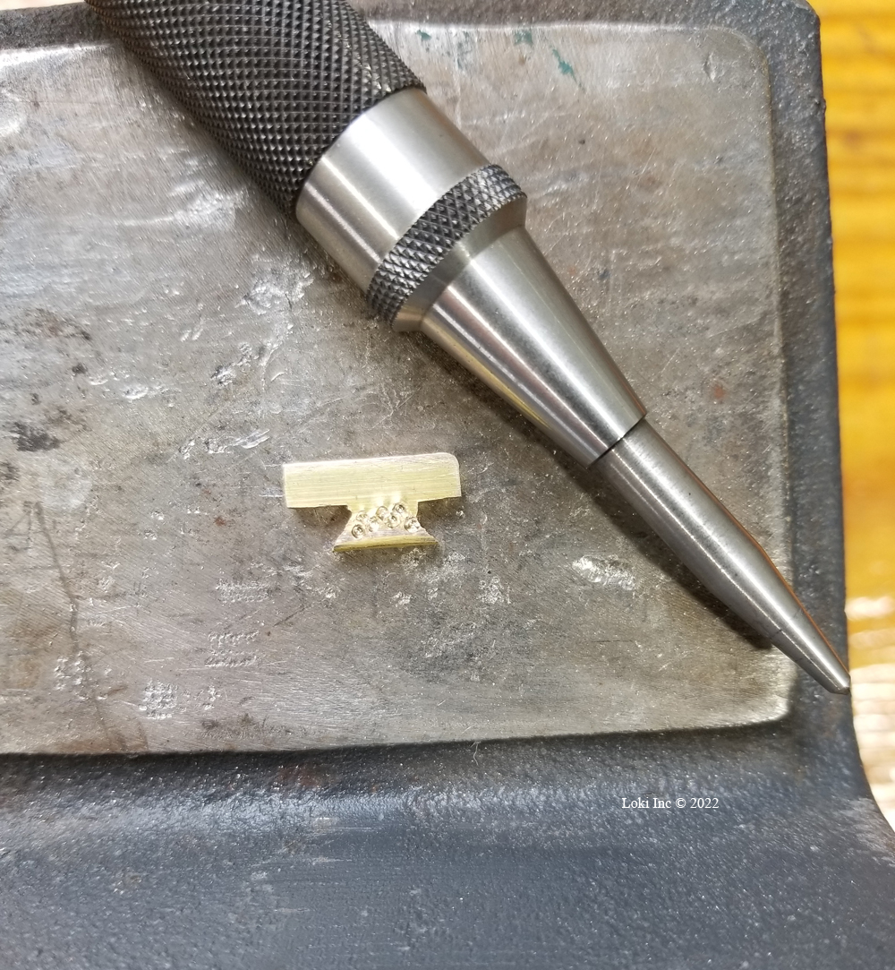 New front sight blade after peening