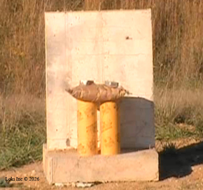 Steel-Reinforced Barrier Shot with 50 pound TNT Equivalent Charge at 8 inch Standoff - Photo 1 from Sequence